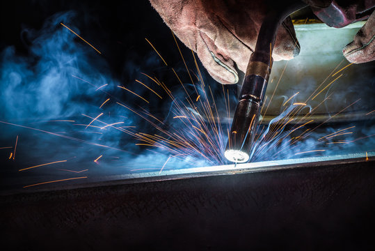 Welding at the bench in the Accents & Arts workshop